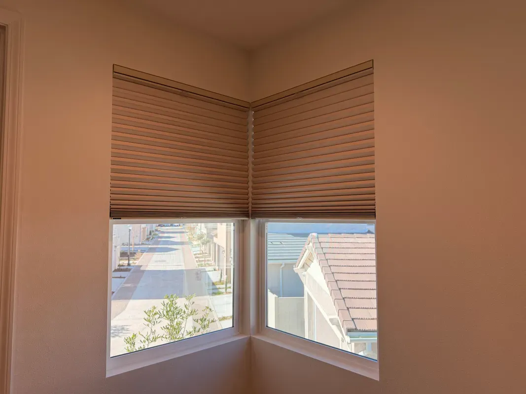 Cellular shades on corner windows